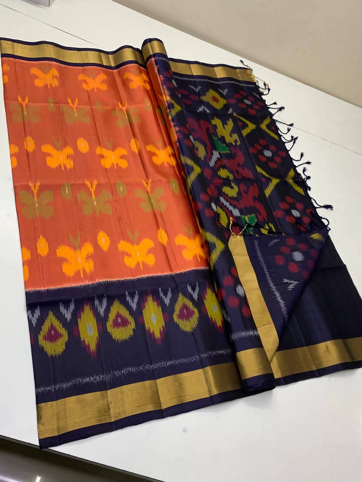 Orange Navy Blue Pochampally Ikkat Silk Saree Butterfly Motifs